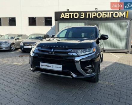 Черный Мицубиси Аутлендер, объемом двигателя 2 л и пробегом 67 тыс. км за 23000 $, фото 1 на Automoto.ua