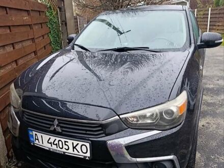 Чорний Міцубісі Аутлендер, об'ємом двигуна 2 л та пробігом 148 тис. км за 13000 $, фото 1 на Automoto.ua