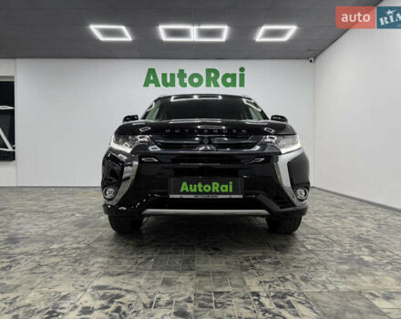 Чорний Міцубісі Аутлендер, об'ємом двигуна 2 л та пробігом 67 тис. км за 22999 $, фото 1 на Automoto.ua