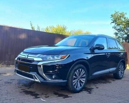 Чорний Міцубісі Аутлендер, об'ємом двигуна 2.4 л та пробігом 132 тис. км за 17600 $, фото 1 на Automoto.ua