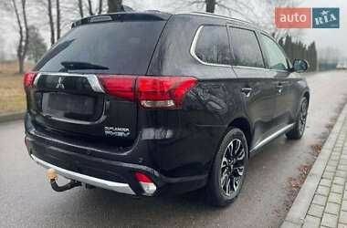 Мицубиси Аутлендер 2018 в Хмельницком на Automoto.ua Черный Мицубиси Аутлендер, объемом двигателя 2 л и пробегом 104 тыс. км за 16800 $, фото 1 на Automoto.ua