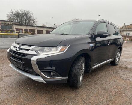 Черный Мицубиси Аутлендер, объемом двигателя 2 л и пробегом 76 тыс. км за 20800 $, фото 1 на Automoto.ua