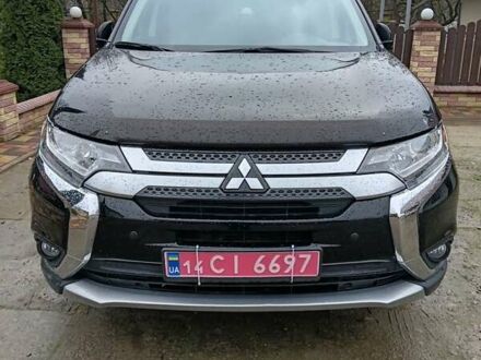 Чорний Міцубісі Аутлендер, об'ємом двигуна 2 л та пробігом 96 тис. км за 22000 $, фото 1 на Automoto.ua