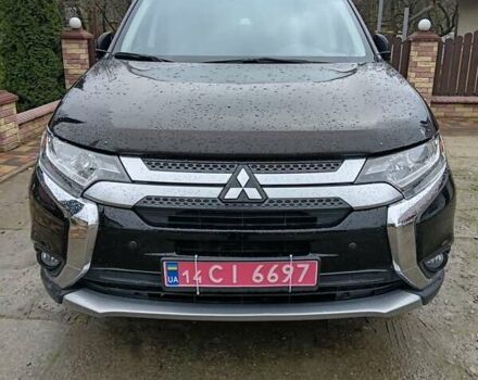 Чорний Міцубісі Аутлендер, об'ємом двигуна 2 л та пробігом 96 тис. км за 22000 $, фото 1 на Automoto.ua