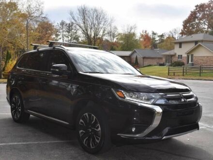 Черный Мицубиси Аутлендер, объемом двигателя 2 л и пробегом 45 тыс. км за 14000 $, фото 1 на Automoto.ua