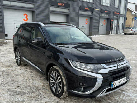 Черный Мицубиси Аутлендер, объемом двигателя 2.36 л и пробегом 125 тыс. км за 23000 $, фото 1 на Automoto.ua