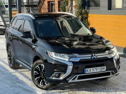 Чорний Міцубісі Аутлендер, об'ємом двигуна 0 л та пробігом 115 тис. км за 20000 $, фото 1 на Automoto.ua