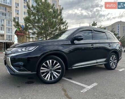 Чорний Міцубісі Аутлендер, об'ємом двигуна 2.36 л та пробігом 90 тис. км за 26500 $, фото 1 на Automoto.ua