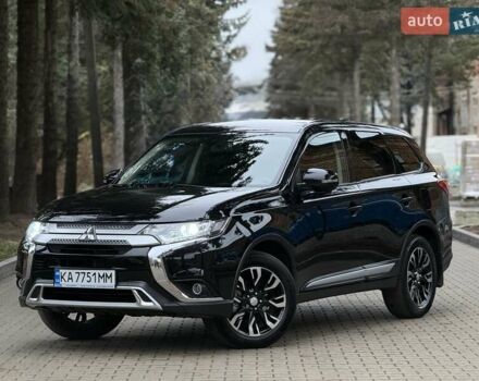 Черный Мицубиси Аутлендер, объемом двигателя 2 л и пробегом 65 тыс. км за 19950 $, фото 1 на Automoto.ua