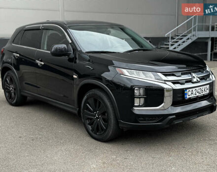 Чорний Міцубісі Аутлендер, об'ємом двигуна 2 л та пробігом 77 тис. км за 14800 $, фото 1 на Automoto.ua