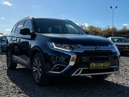 Чорний Міцубісі Аутлендер, об'ємом двигуна 2.4 л та пробігом 97 тис. км за 17700 $, фото 1 на Automoto.ua