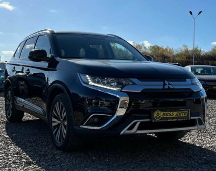 Чорний Міцубісі Аутлендер, об'ємом двигуна 2.4 л та пробігом 97 тис. км за 17700 $, фото 1 на Automoto.ua