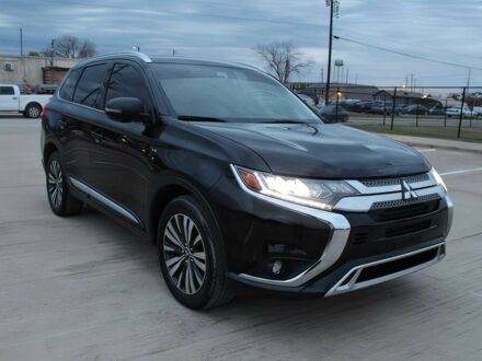 Черный Мицубиси Аутлендер, объемом двигателя 3 л и пробегом 43 тыс. км за 6400 $, фото 1 на Automoto.ua