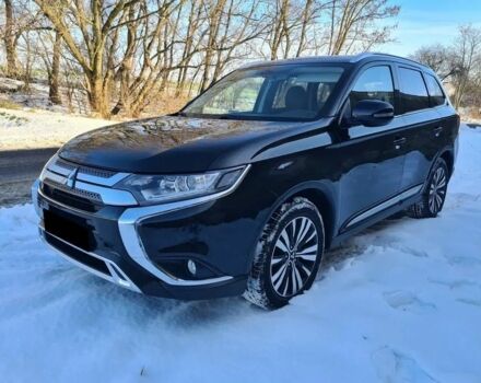 Чорний Міцубісі Аутлендер, об'ємом двигуна 0 л та пробігом 98 тис. км за 11200 $, фото 1 на Automoto.ua