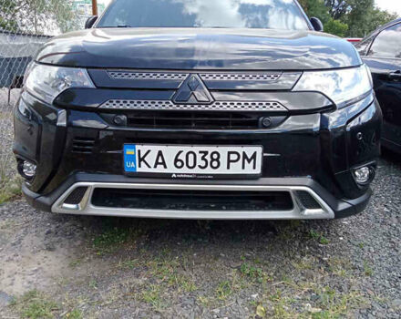Черный Мицубиси Аутлендер, объемом двигателя 0 л и пробегом 105 тыс. км за 18500 $, фото 1 на Automoto.ua