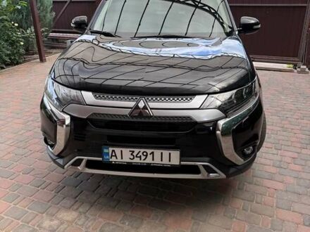 Мицубиси Аутлендер 2019 в Киеве на Automoto.ua Черный Мицубиси Аутлендер, объемом двигателя 2.36 л и пробегом 93 тыс. км за 22400 $, фото 1 на Automoto.ua