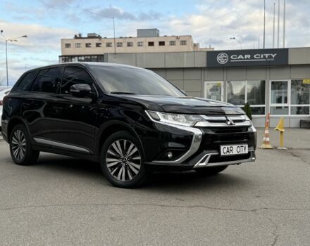 Чорний Міцубісі Аутлендер, об'ємом двигуна 2.4 л та пробігом 107 тис. км за 16250 $, фото 1 на Automoto.ua