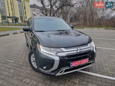 Чорний Міцубісі Аутлендер, об'ємом двигуна 2.36 л та пробігом 127 тис. км за 20800 $, фото 1 на Automoto.ua