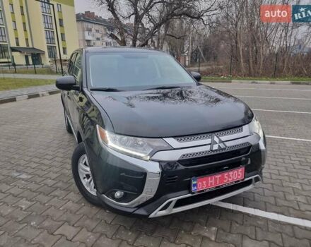 Черный Мицубиси Аутлендер, объемом двигателя 2.36 л и пробегом 127 тыс. км за 20800 $, фото 1 на Automoto.ua