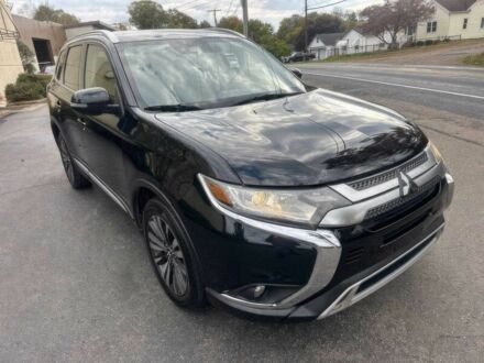 Чорний Міцубісі Аутлендер, об'ємом двигуна 2.4 л та пробігом 40 тис. км за 12000 $, фото 1 на Automoto.ua