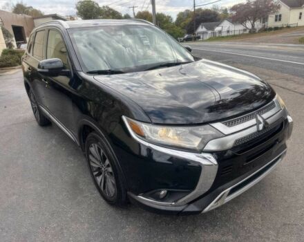 Черный Мицубиси Аутлендер, объемом двигателя 2.4 л и пробегом 40 тыс. км за 12000 $, фото 1 на Automoto.ua