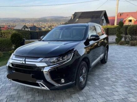 Черный Мицубиси Аутлендер, объемом двигателя 2.4 л и пробегом 1 тыс. км за 14400 $, фото 1 на Automoto.ua