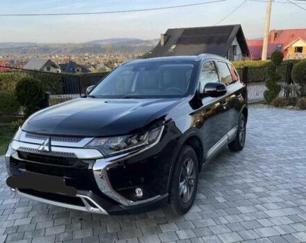 Черный Мицубиси Аутлендер, объемом двигателя 2.4 л и пробегом 1 тыс. км за 14400 $, фото 1 на Automoto.ua