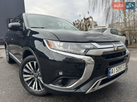 Черный Мицубиси Аутлендер, объемом двигателя 2.4 л и пробегом 44 тыс. км за 18700 $, фото 1 на Automoto.ua