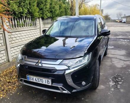 Черный Мицубиси Аутлендер, объемом двигателя 2.36 л и пробегом 50 тыс. км за 21000 $, фото 1 на Automoto.ua