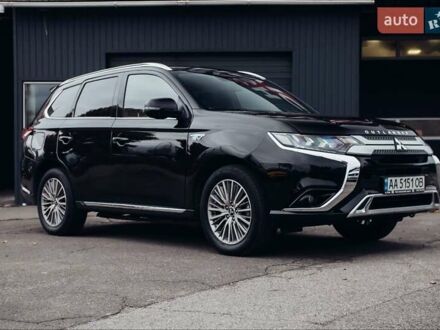 Черный Мицубиси Аутлендер, объемом двигателя 2.36 л и пробегом 110 тыс. км за 28900 $, фото 1 на Automoto.ua
