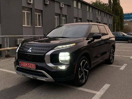 Черный Мицубиси Аутлендер, объемом двигателя 2.49 л и пробегом 70 тыс. км за 21000 $, фото 1 на Automoto.ua