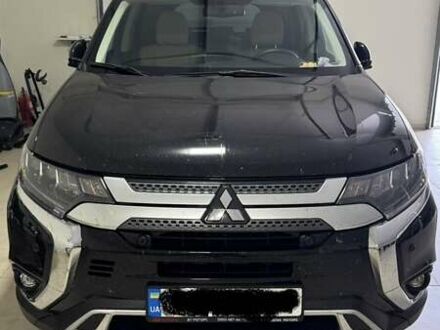 Черный Мицубиси Аутлендер, объемом двигателя 2.36 л и пробегом 60 тыс. км за 25000 $, фото 1 на Automoto.ua