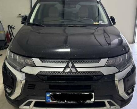 Черный Мицубиси Аутлендер, объемом двигателя 2.36 л и пробегом 60 тыс. км за 25000 $, фото 1 на Automoto.ua