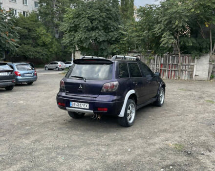 Фиолетовый Мицубиси Аутлендер, объемом двигателя 2.4 л и пробегом 200 тыс. км за 3500 $, фото 3 на Automoto.ua