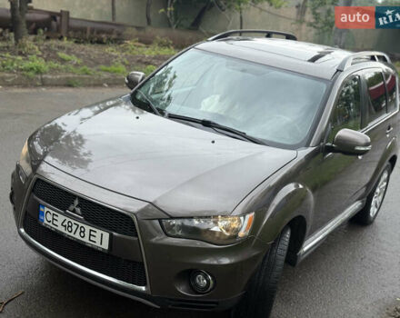 Коричневий Міцубісі Аутлендер, об'ємом двигуна 2.36 л та пробігом 200 тис. км за 9150 $, фото 1 на Automoto.ua