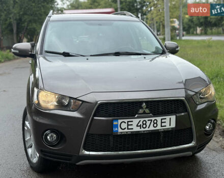 Коричневий Міцубісі Аутлендер, об'ємом двигуна 2.36 л та пробігом 200 тис. км за 9150 $, фото 3 на Automoto.ua