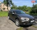 Коричневый Мицубиси Аутлендер, объемом двигателя 2 л и пробегом 250 тыс. км за 9300 $, фото 1 на Automoto.ua