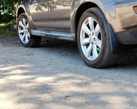 Коричневый Мицубиси Аутлендер, объемом двигателя 2.2 л и пробегом 210 тыс. км за 11500 $, фото 4 на Automoto.ua