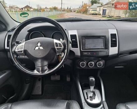 Міцубісі Аутлендер 2010 у Харкові на Automoto.ua Коричневий Міцубісі Аутлендер, об'ємом двигуна 2 л та пробігом 207 тис. км за 10950 $, фото 14 на Automoto.ua