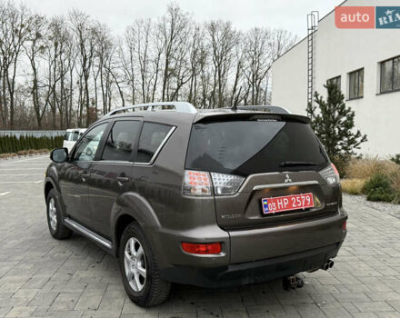 Коричневий Міцубісі Аутлендер, об'ємом двигуна 2.2 л та пробігом 235 тис. км за 10600 $, фото 7 на Automoto.ua