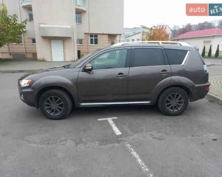 Коричневий Міцубісі Аутлендер, об'ємом двигуна 2.2 л та пробігом 240 тис. км за 10900 $, фото 1 на Automoto.ua
