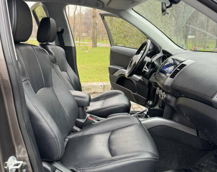 Коричневый Мицубиси Аутлендер, объемом двигателя 2.18 л и пробегом 208 тыс. км за 10555 $, фото 32 на Automoto.ua