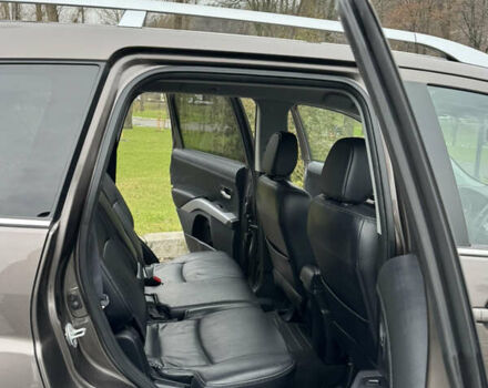 Коричневый Мицубиси Аутлендер, объемом двигателя 2.18 л и пробегом 208 тыс. км за 10555 $, фото 48 на Automoto.ua