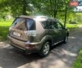 Коричневый Мицубиси Аутлендер, объемом двигателя 2 л и пробегом 250 тыс. км за 9300 $, фото 15 на Automoto.ua