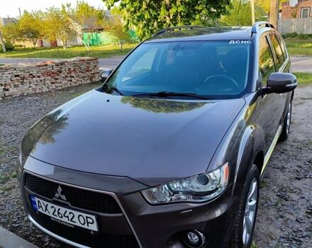 Коричневый Мицубиси Аутлендер, объемом двигателя 2.2 л и пробегом 210 тыс. км за 11500 $, фото 1 на Automoto.ua