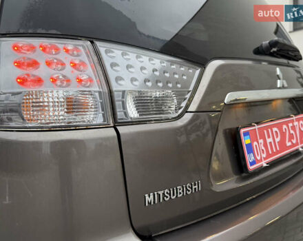 Коричневий Міцубісі Аутлендер, об'ємом двигуна 2.2 л та пробігом 235 тис. км за 10600 $, фото 9 на Automoto.ua