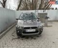 Коричневий Міцубісі Аутлендер, об'ємом двигуна 2.3 л та пробігом 164 тис. км за 14500 $, фото 1 на Automoto.ua