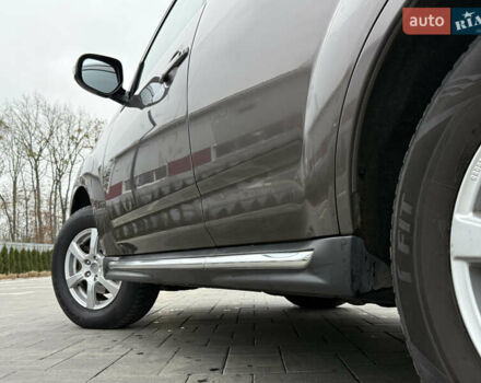 Коричневий Міцубісі Аутлендер, об'ємом двигуна 2.2 л та пробігом 235 тис. км за 10600 $, фото 17 на Automoto.ua