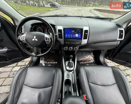 Коричневый Мицубиси Аутлендер, объемом двигателя 2.18 л и пробегом 208 тыс. км за 10555 $, фото 25 на Automoto.ua