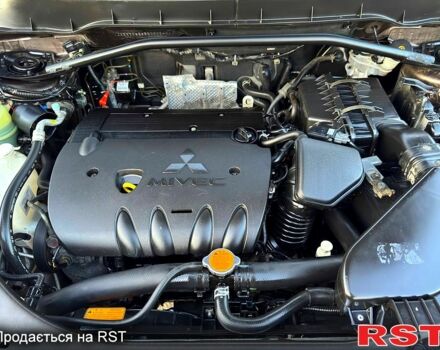 Коричневый Мицубиси Аутлендер, объемом двигателя 2.4 л и пробегом 178 тыс. км за 10550 $, фото 7 на Automoto.ua